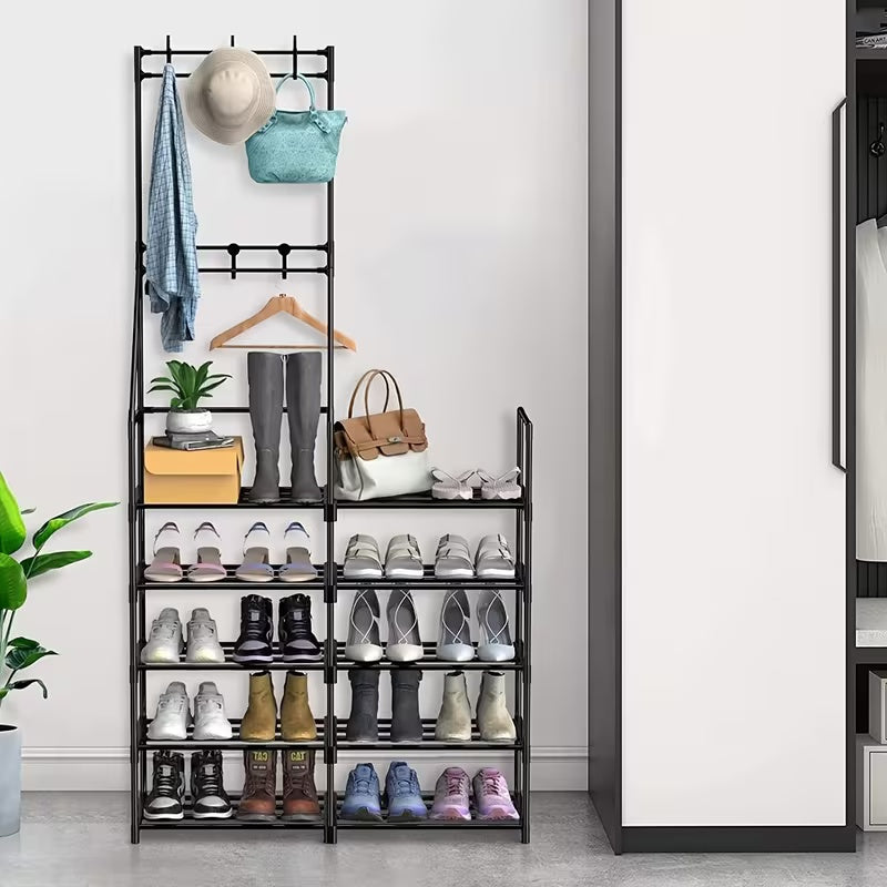 Coat and shoe rack loaded with shoes, boots and bags