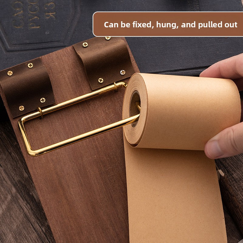 Kraft paper roll being loaded into the memo board holder