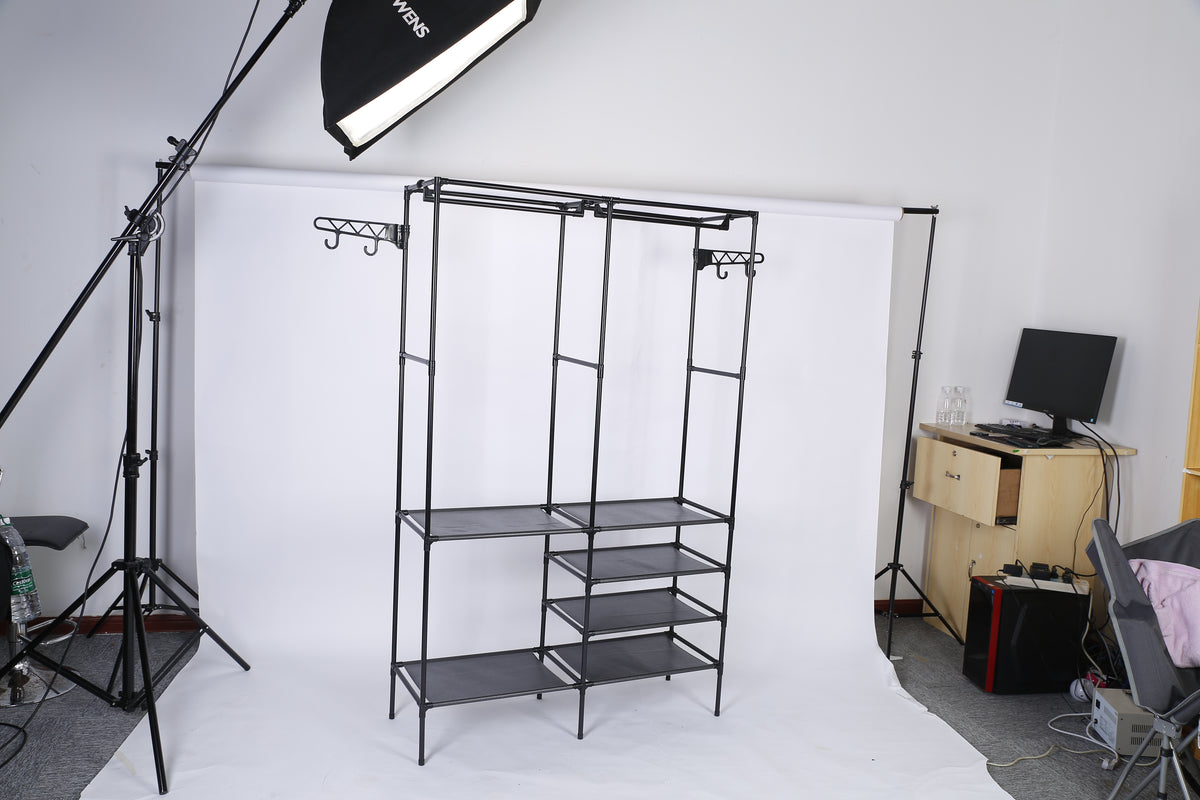 Freestanding double garment rack with fabric shelves and side hooks