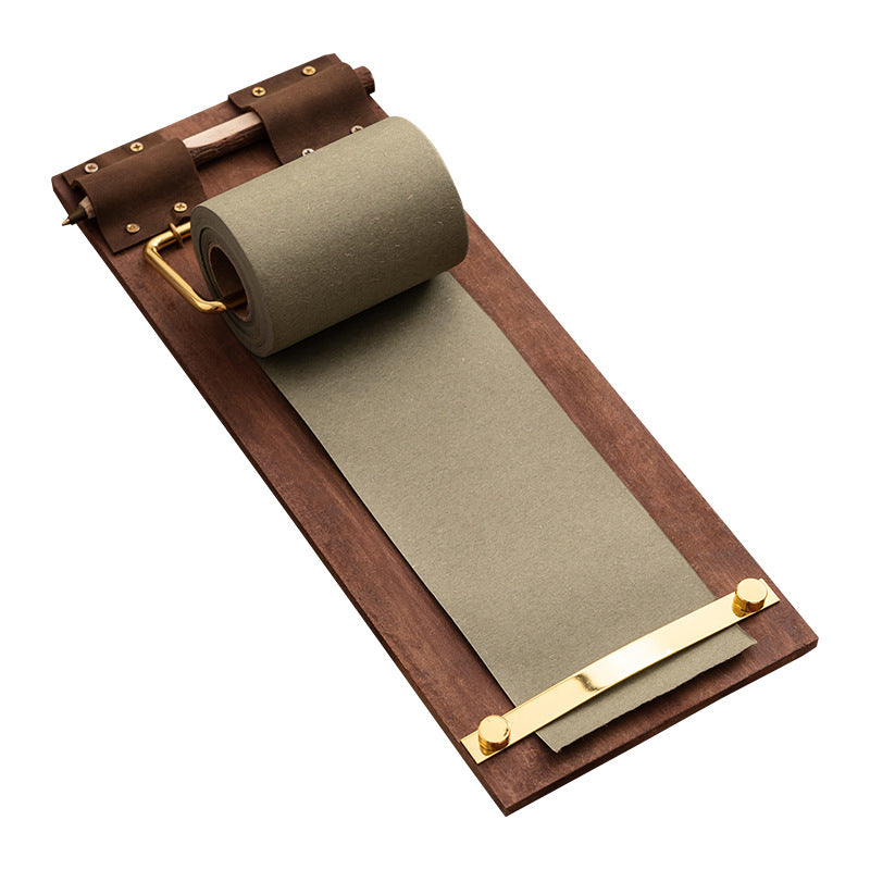 Memo board with green paper roll shown on a white background