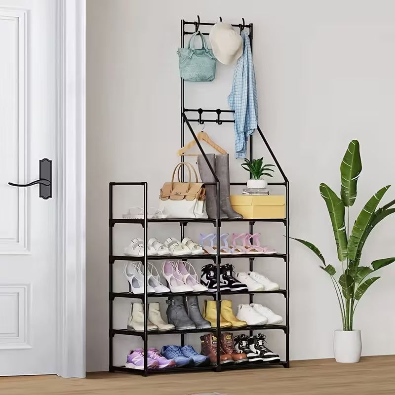 Double-row coat and shoe rack by a front door with coats, bags and shoes