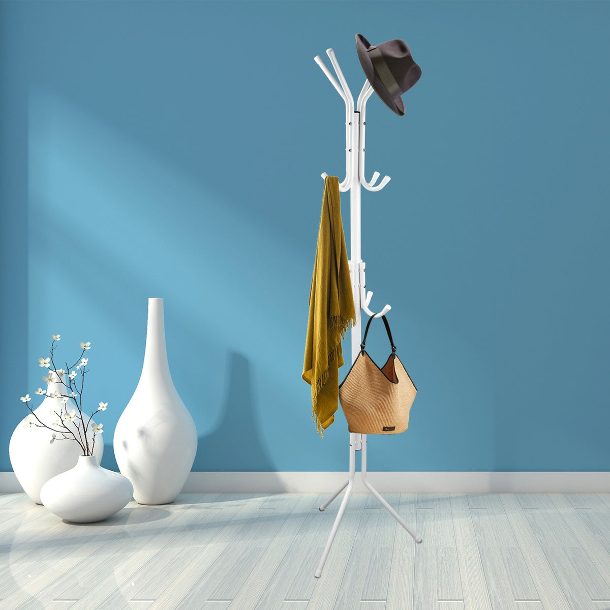 White coat rack with scarf, bag and hat