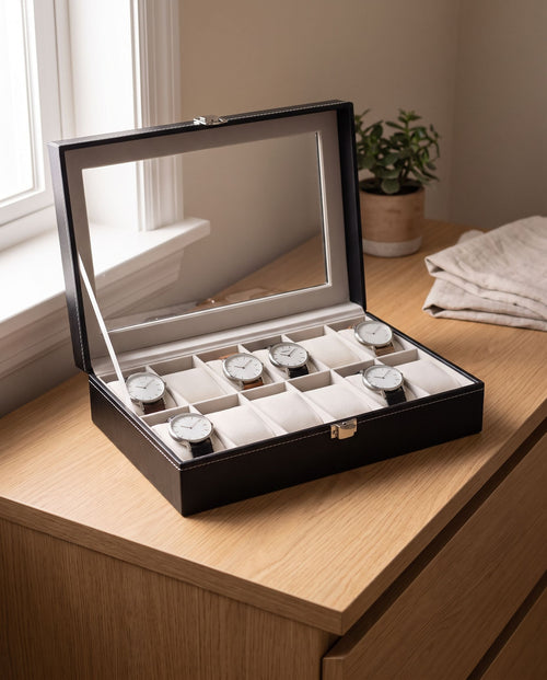 12-slot watch case open on a dresser holding seven watches (watches not included)