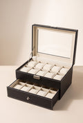 Black two-tier 20-slot watch box with window lid open and drawer pulled out, empty