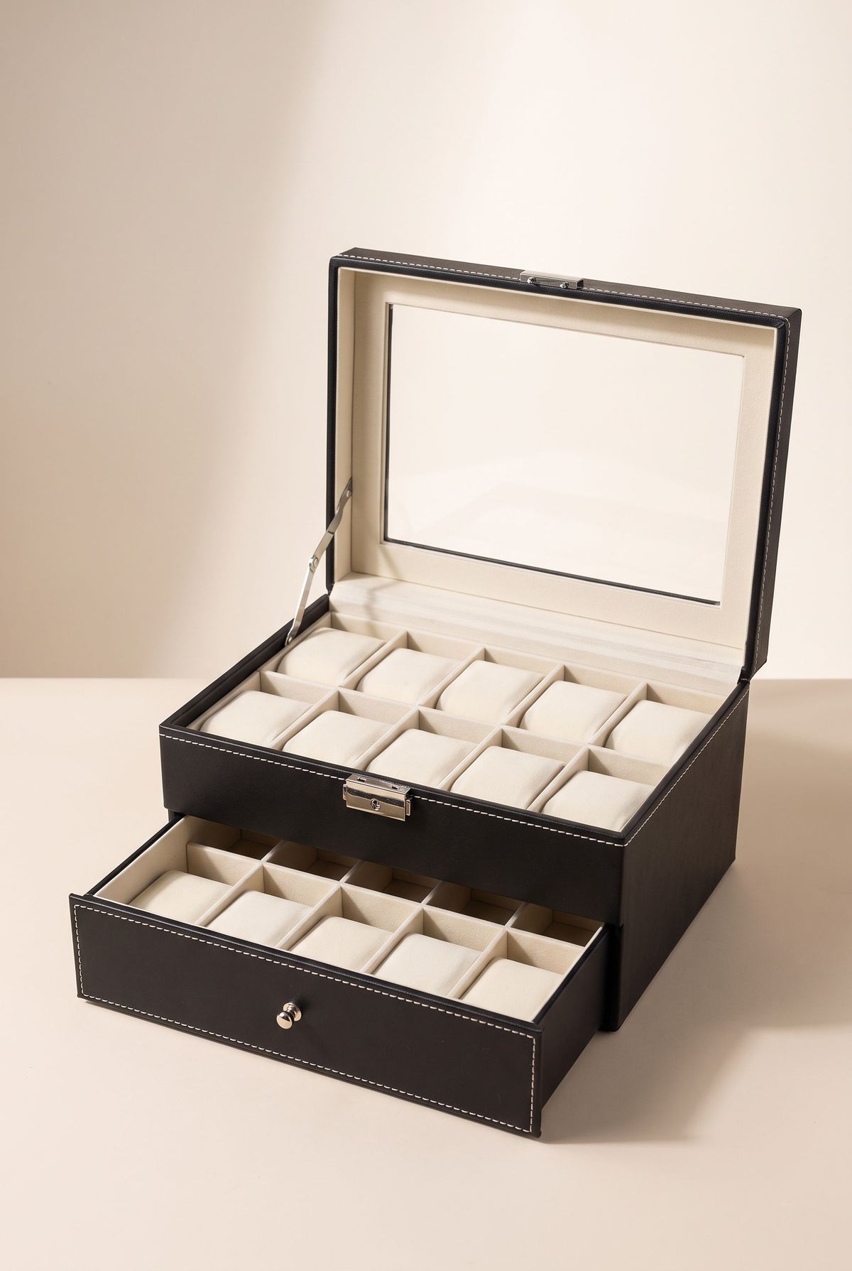 Black two-tier 20-slot watch box with window lid open and drawer pulled out, empty