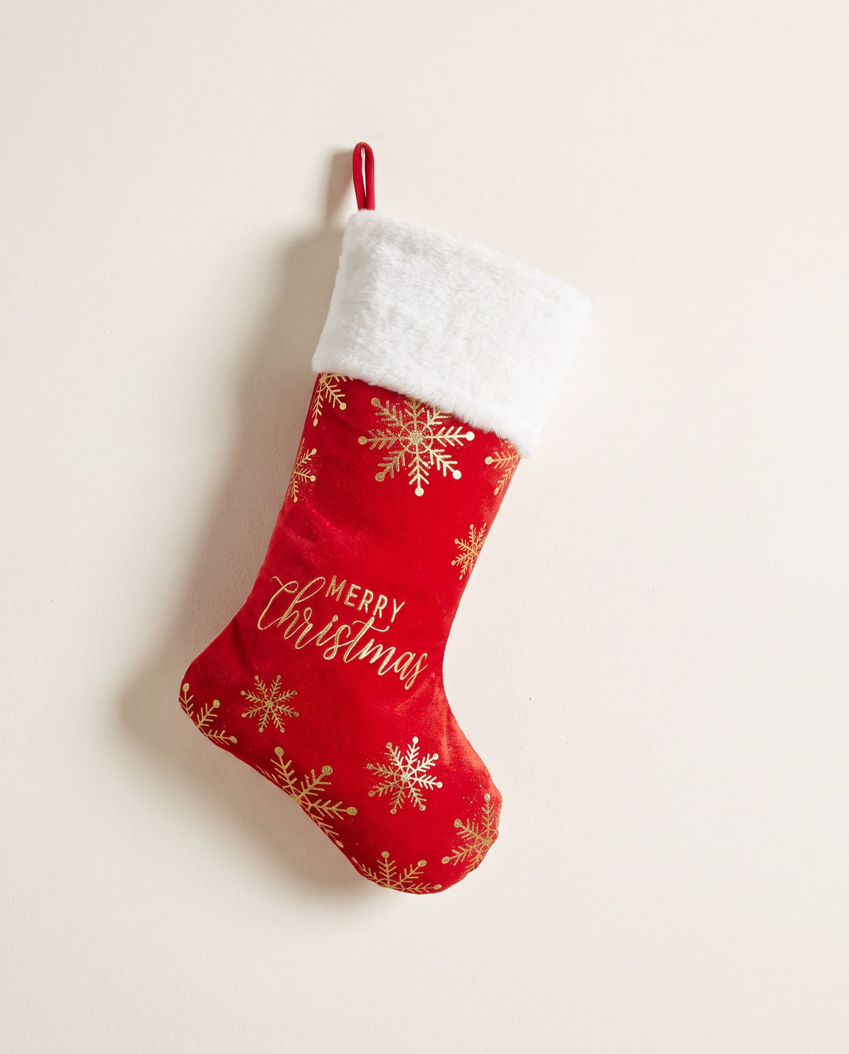 Red velvet Christmas stocking with gold snowflake and Merry Christmas embroidery and white sherpa cuff