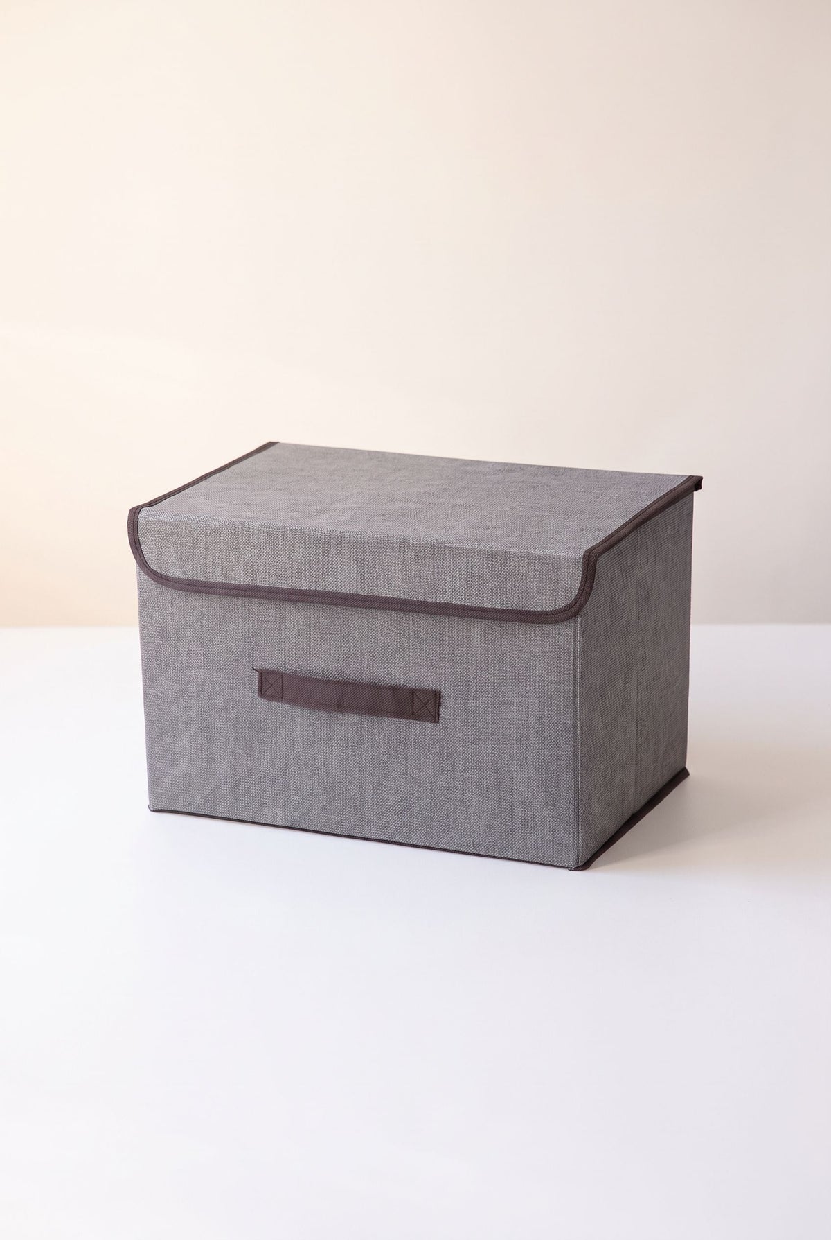 Gray foldable fabric storage box with flip cover and front handle