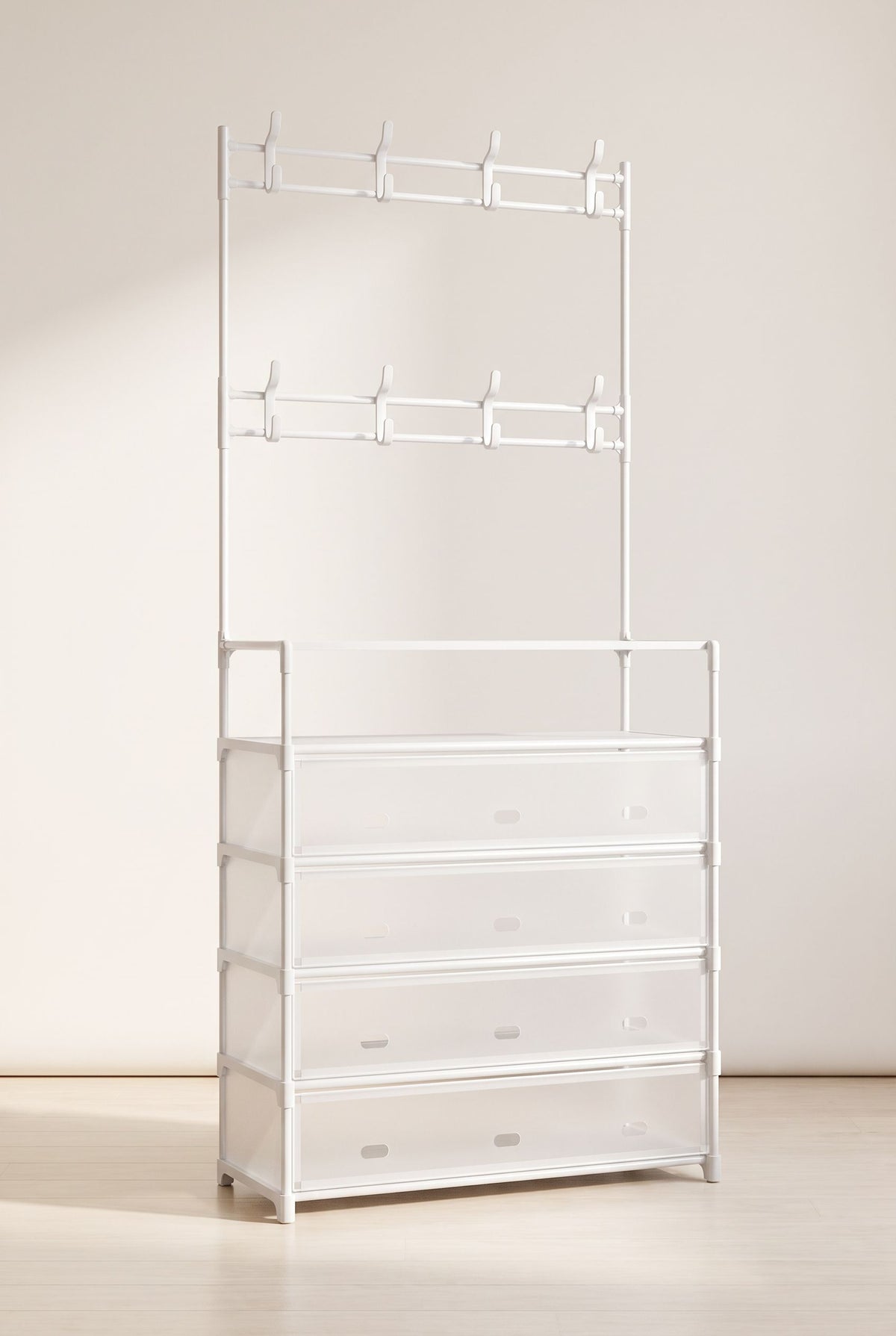 White entryway hall tree with 8 hooks in two rows and five shelf tiers with vented front panels, empty