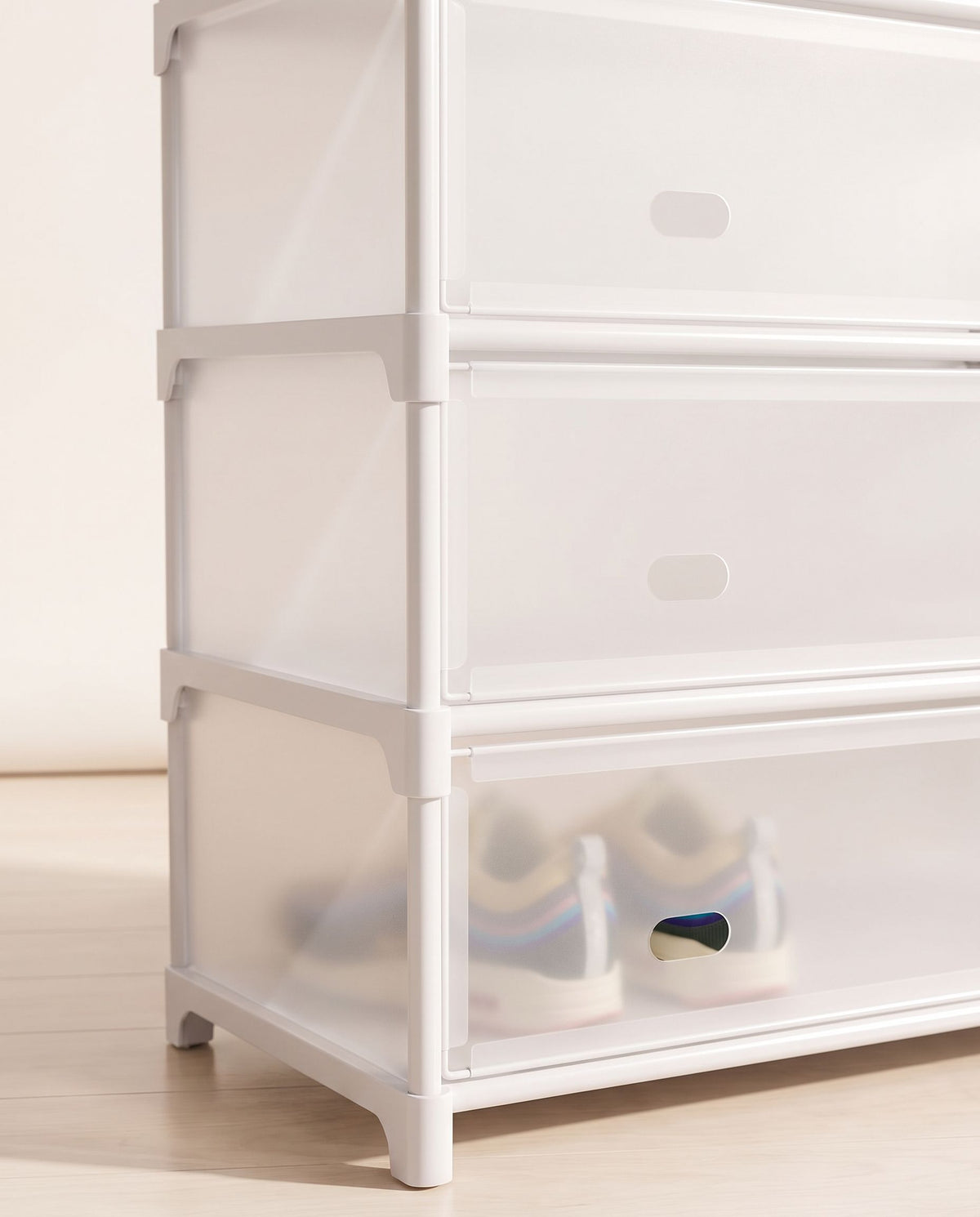 Close detail of the white frosted vented front panels on the shoe tiers