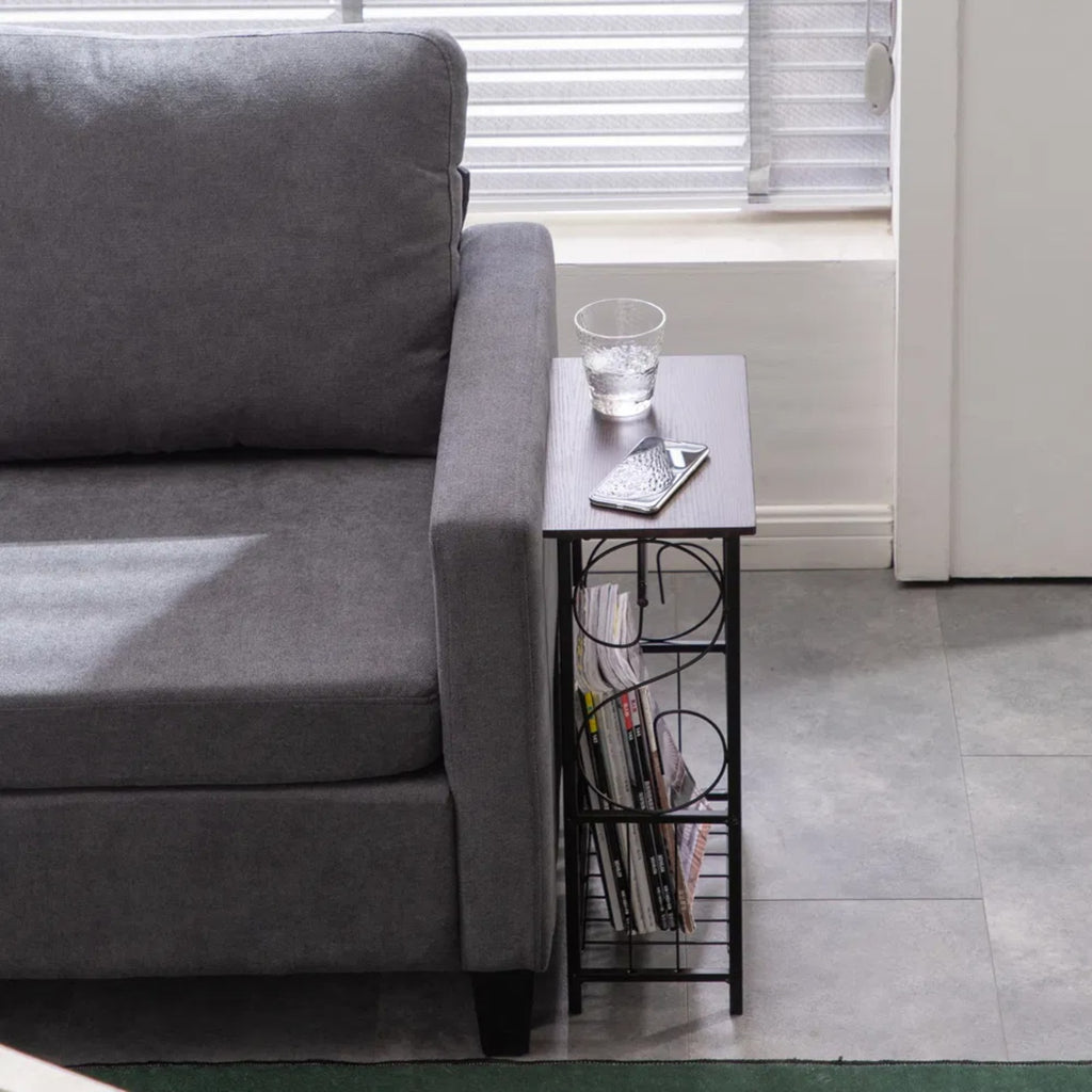 Narrow side table beside a gray sofa